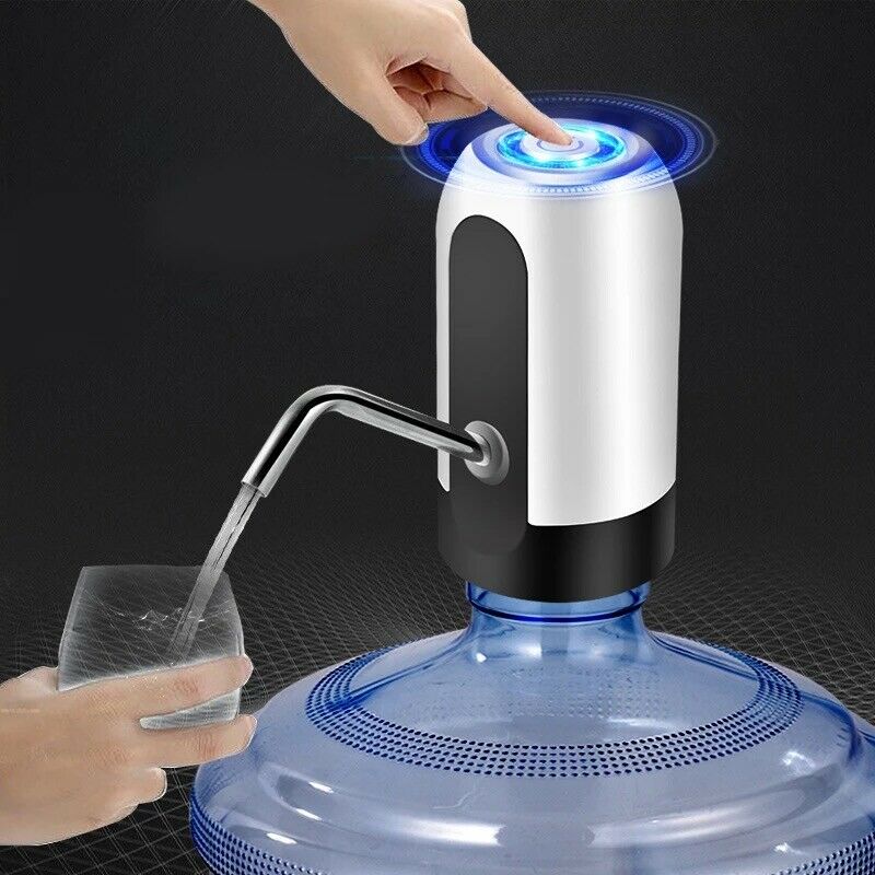 Automatic electric water dispenser pumping water from large bottle into glass