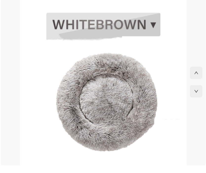 Round fluffy white and brown pet bed with soft plush texture on white background