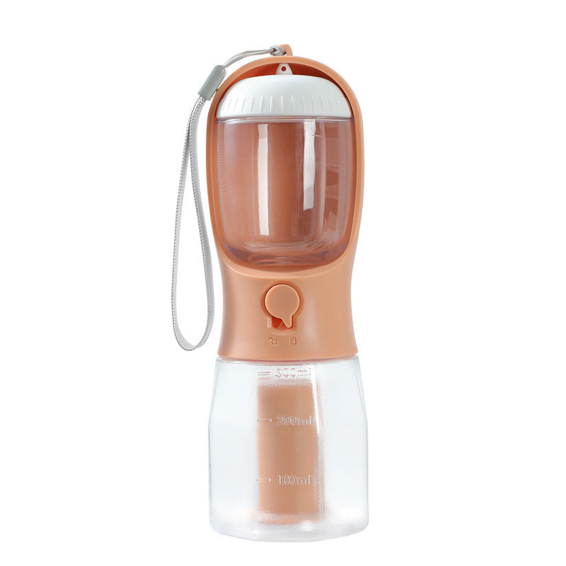 Portable peach-colored pet water bottle with wrist strap and lock, isolated on white background